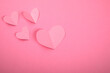 Pink hearts, symbolizes a girl or a woman. Falling in love and relationships concept