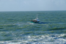 A Small Fishing Boat On The Atlantic Ocean In The West Of France During The Month Of December 2020.