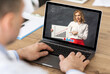 © Prostock-studio - Businessman Having Meeting With Colleague Video Calling Via Laptop Indoor