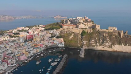 Wall Mural - Aerial drone view of traditional Corricella fisherman village in Procida, island near Naples, Italy
