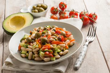 Wall Mural - beans salad with avocado tomatoes olivesand capsicum