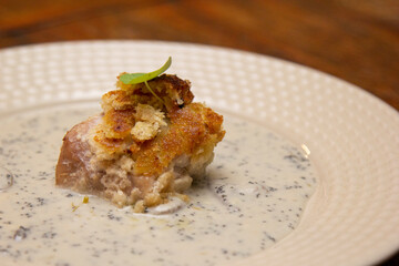 Xareu fish in crust with caviar sauce.