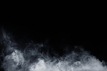 Abstract White Smoke Moves On Black Background. Swirling Smoke.