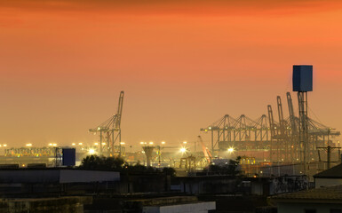 Wall Mural - Cargo port at twilight sky.