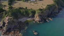 Rocky Torquay Coast In UK With Aerial Reveal Of Thatcher Island