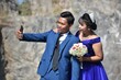 © Robert - Asian wedding couple at the rocky background