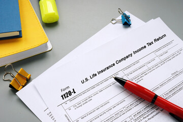 Wall Mural - Form 1120-L U.S. Life Insurance Company Income Tax Return sign on the sheet.