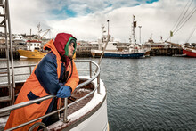 Fisherman In Winter Scandinavian Port