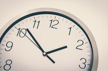 Close-up View Of Clock - Deadline And Time Concept
