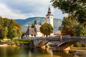 Sticker - Slender bell tower and old stone bridge