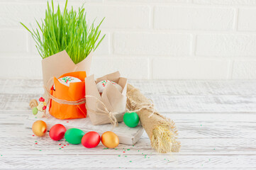 Wall Mural - Easter background. Traditional food on the holiday table - Easter Cake and Easter painted eggs. Easter recipe.