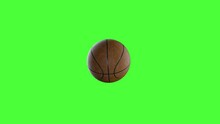 Basketball Hit The Basket In Slow Motion On A Green Background
