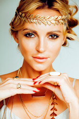 Poster - young blond woman dressed like ancient greek godess, gold jewelry close up isolated, summer trends