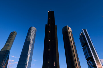 Madrid skyscraper at sunset with blue sky in winter season