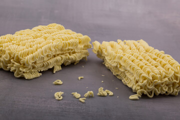 Wall Mural - dried instant noodles, isolated on gray background.