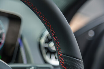 Sticker - Closeup shot of a modern car steering wheel details