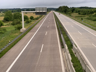 Poster - High angle shot of a two-sided highway with a few card