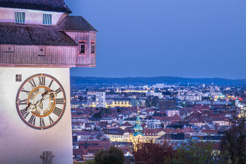 The city center of Graz, Austria with its landmark the Uhrturm at the Schloßberg