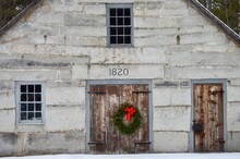 1820 Stone Building With Christmas Wreath