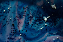Painted Galaxy Art Created In Oil And Milk. Galaxies Evolve In This Artistic Science Experiment. Alien Landscape. Purple, Red And Blue Abstract Formations Take Shape In An Alternate Universe.