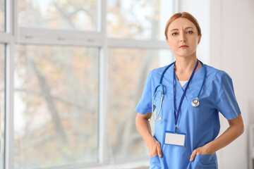 Canvas Print - Portrait of female doctor in clinic