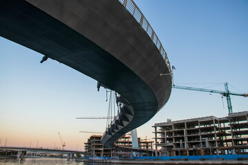 Dubai, UAE - 01.08.2021 Bridge over a Dubai Water canal known as Tolerance bridge. Outdoors