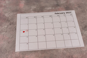 February 14 is marked in red on the calendar