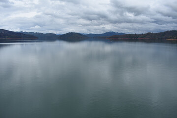 Poster - Beautiful shot of lake with the reflection of cloudy sky, Lewiston Lake, California