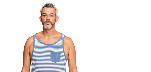 Sticker - Middle age grey-haired man wearing casual style with sleeveless shirt with serious expression on face. simple and natural looking at the camera.