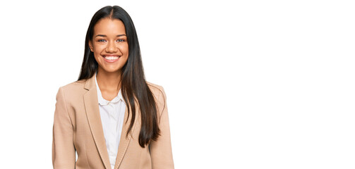 Beautiful hispanic woman wearing business jacket with a happy and cool smile on face. lucky person.