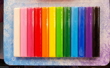 Colorful crayon or chalk on packaging for sale at stationery store. Group of Art object or retail and Color pattern.