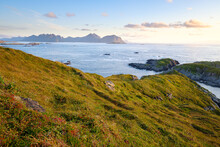 sunset over the sea in northern norway, with a view over the vesterålen islands