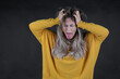 © MrsLePew - Angry woman tearing her hair