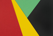 February Black History Month. Abstract Paper Geometric Black, Red, Yellow, Green Background. Copy Space, Place For Your Text.