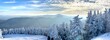 Panoramic mountain view of beautiful mountain peaks at snow day on the top of Stowe Mountain Ski resort, Vermont - December 2020