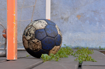 Handball ball on an old floor