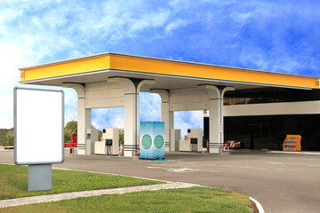 Empty billboard on modern gas station outdoors, space for design