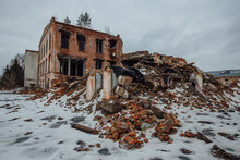 Remains Of Demolished Old Industrial Building. Pile Of Stones, Bricks And Debris