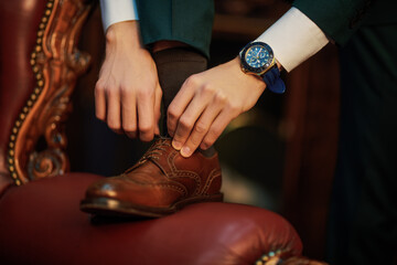 shoes and wrist watch