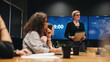 © Jacob Lund - Businesswoman addressing boardroom meeting