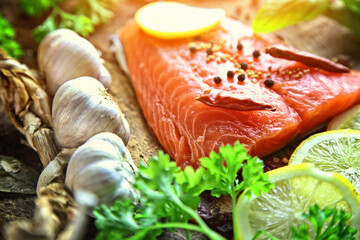 healthy delicious salmon with salt, lemon and salad