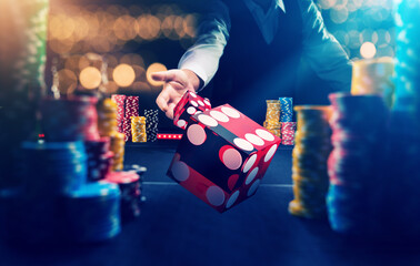 Wall Mural - Man gambling at the craps table at the casino