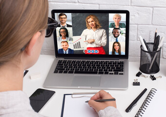 Aufkleber - Businesswoman at laptop making video call meeting with colleagues indoor