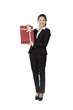 © eastfenceimage - A young Business woman holding gift box