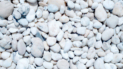 Wall Mural - white pebbles on the beach, white stone for background