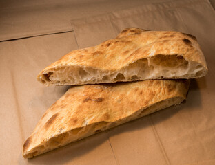 Sticker - Baked focaccia - bread of sourdough - Close up of cut loaf showing the alveoli as test of gluten strengthe