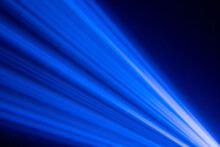 Blue Ray Light Beam In Concert. Abstract Blue Light In Black Background.