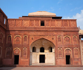 Wall Mural - Exterior of Jahangiri mahal in Agra Fort with carved details in red sandstone. Agra, Uttar Pradesh, India