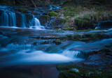 Fototapeta Łazienka - Wild brook with stones and waterfall in Jeseniky mountains, Eastern Europe, Moravia. Clean fresh cold watter, water stream. Long exposure image. .