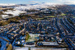 © whitcomberd - Aerial view of a snow covered town on a bright, sunny winters day